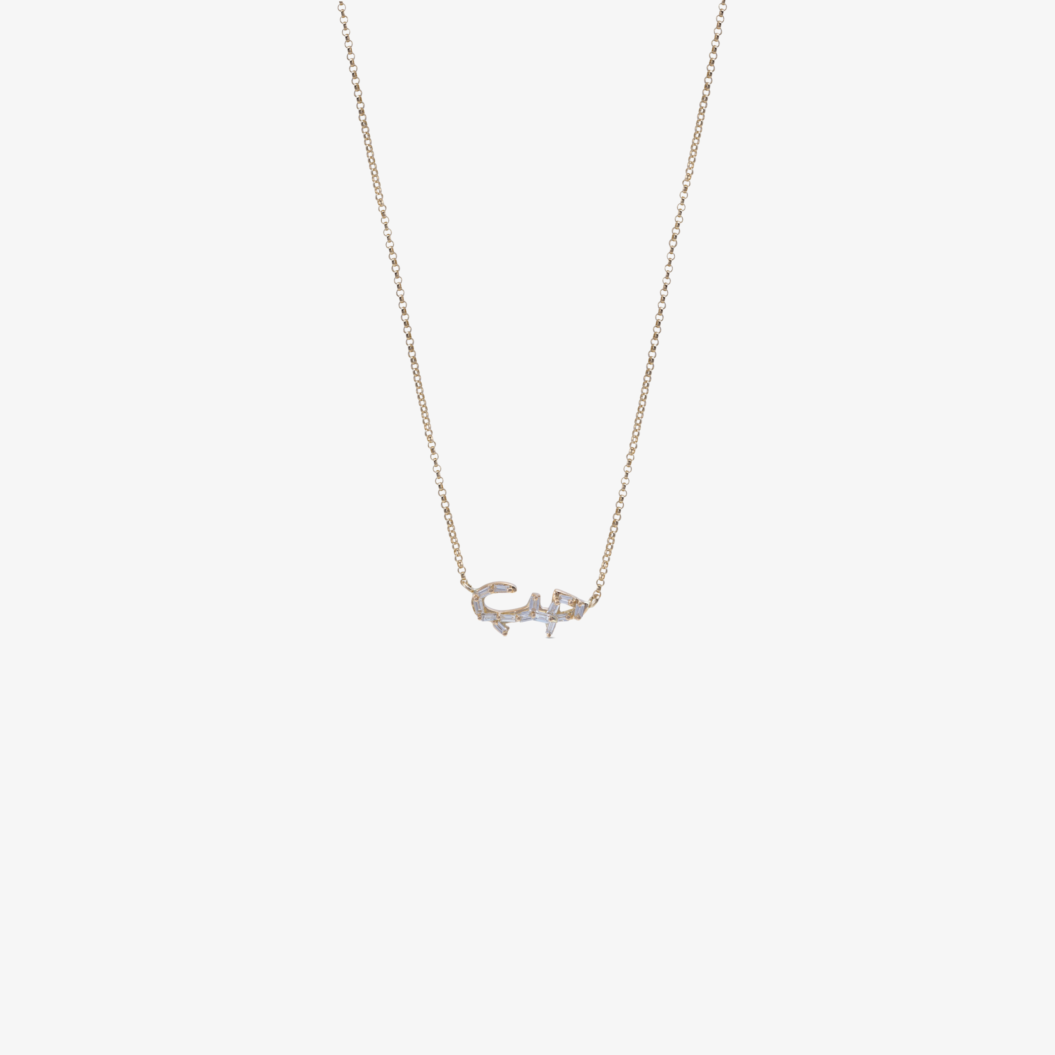 HOBB — 18K Gold Baguette Diamond “Love” Pendant