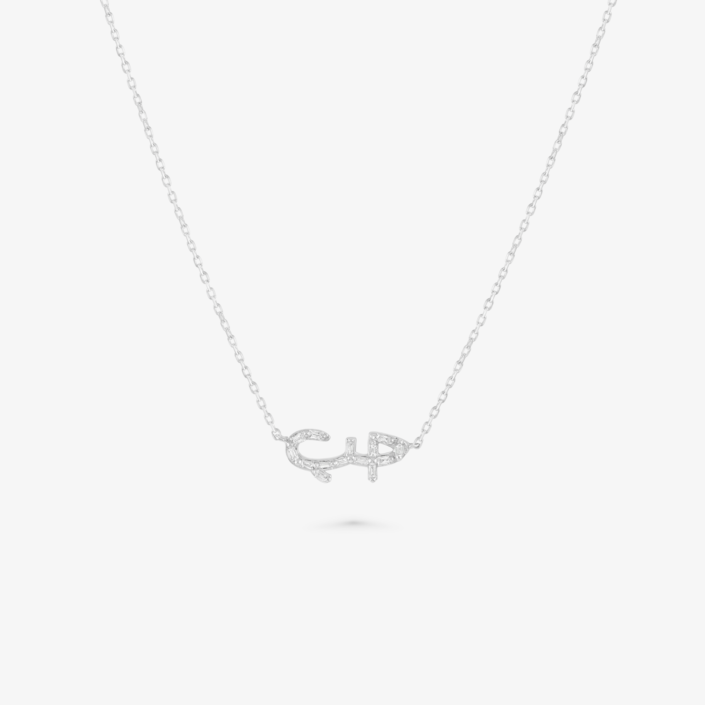 HOBB — 18K Gold Baguette Diamond “Love” Pendant